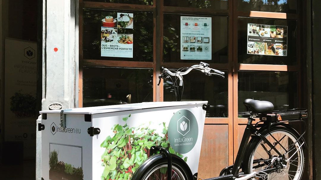 Various examples of InstaGreen branding and graphic design - cargobike and posters